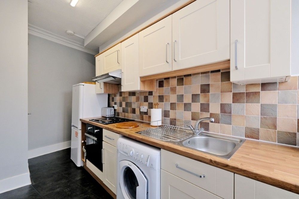Property photo 3 of 8 Kitchen