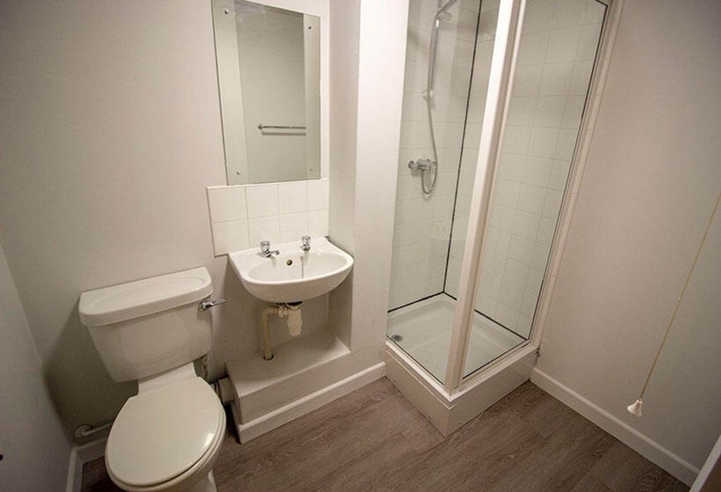 Property photo 1 of 9 A Modern Bathroom Featuring A Sleek Shower, Minima...