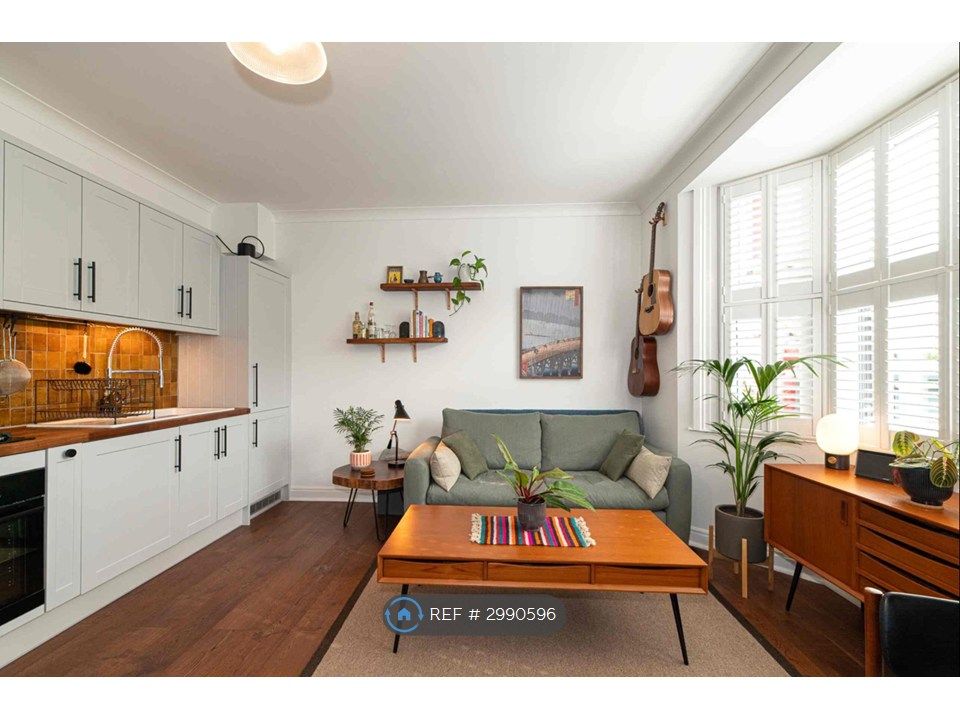 Property photo 1 of 12 Downstairs Living & Kitchen