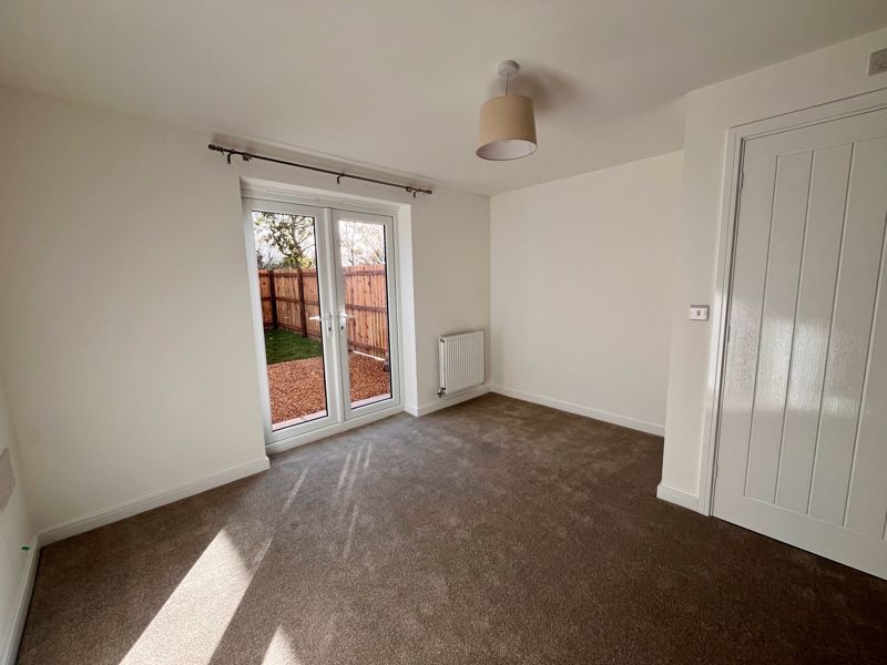 Property photo 2 of 11 Living Area