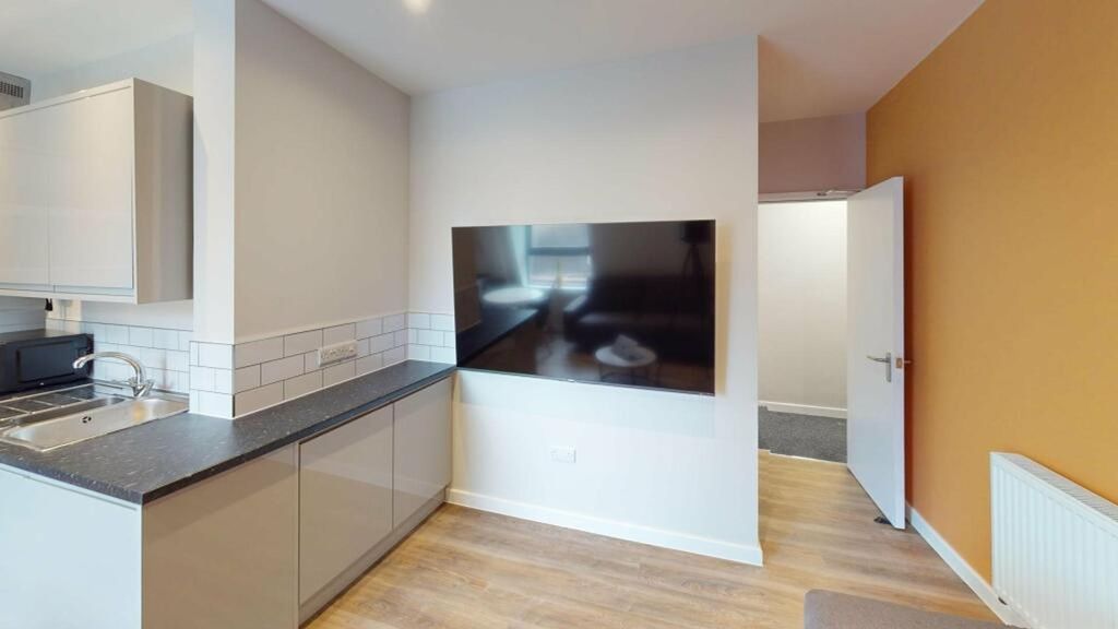 Property photo 2 of 14 A Modern Kitchenette With Sleek Finishes And Ample...