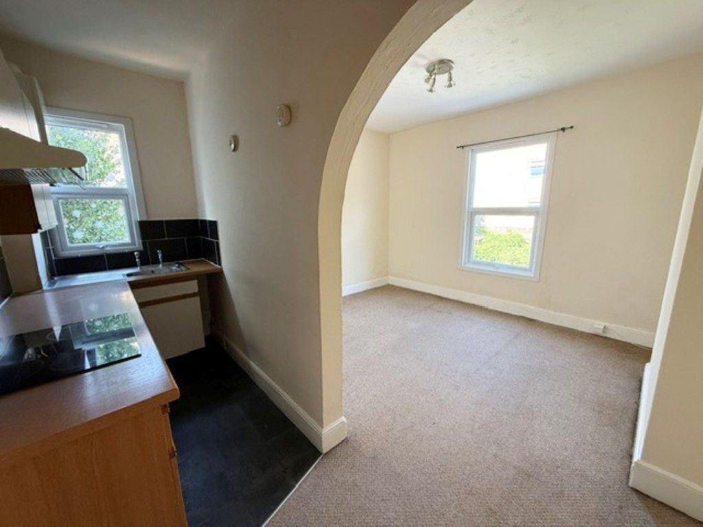 Property photo 2 of 10 Living Room With Archway To Fitted Kitchen Area