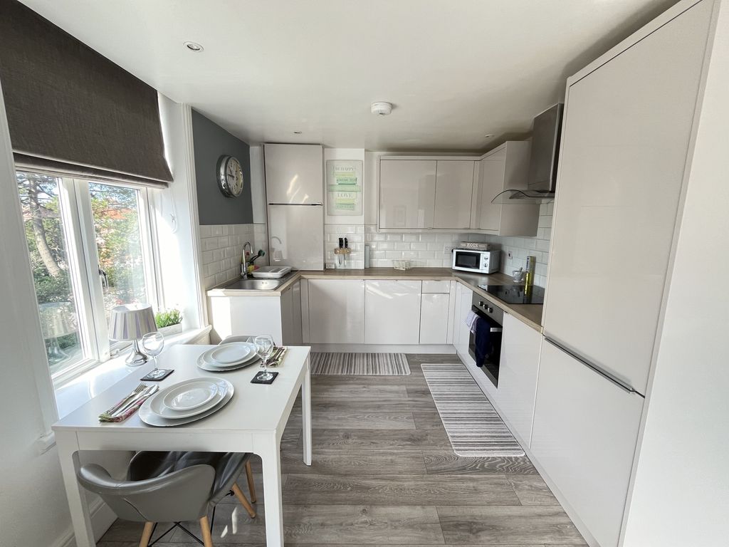 Property photo 2 of 8 Kitchen