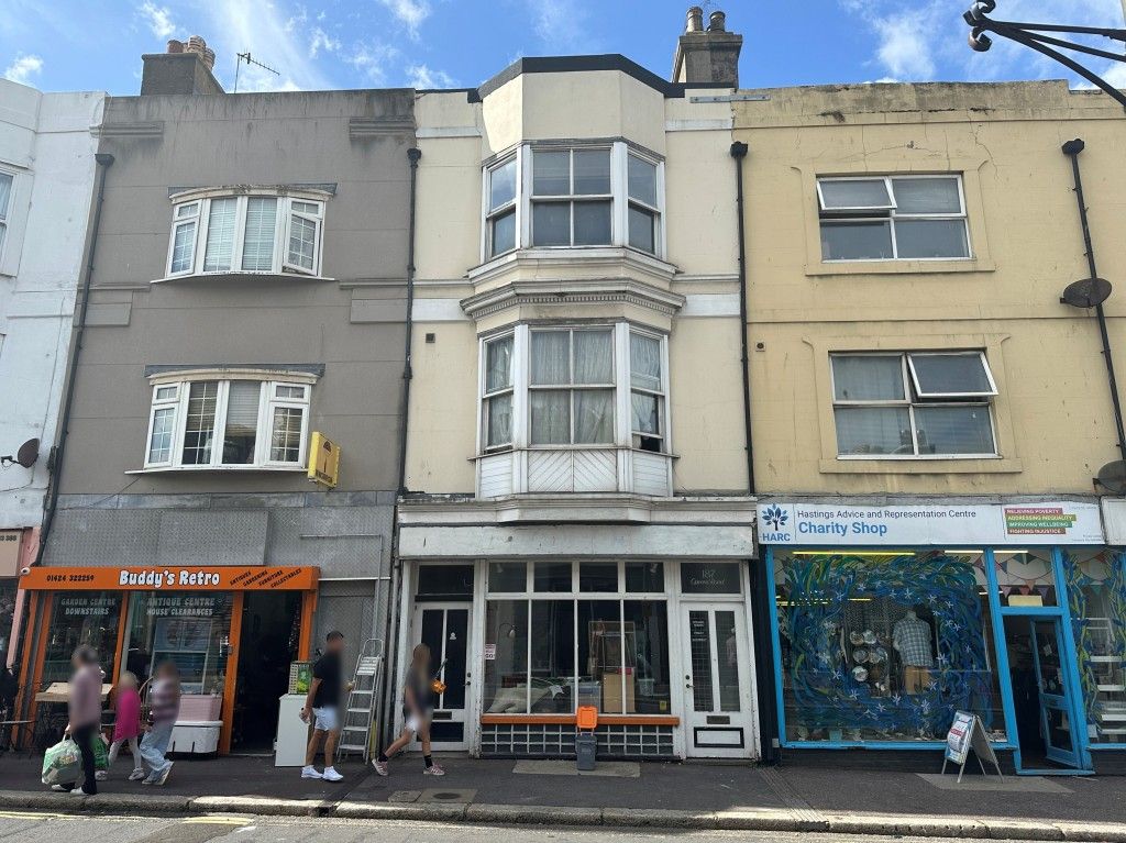 Property photo 1 of 1 Front Of Property Showing Glass Shop Front And Bay Windows On First And Second Floors