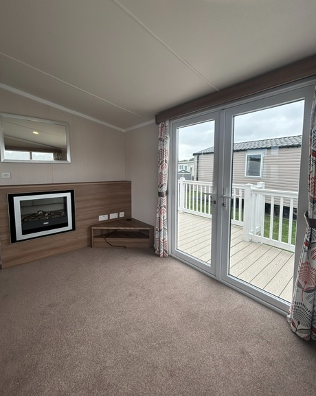 Property photo 2 of 4 Swift Biarritz Lounge With Feature Fireplace, Neutral Interiors And French Doors