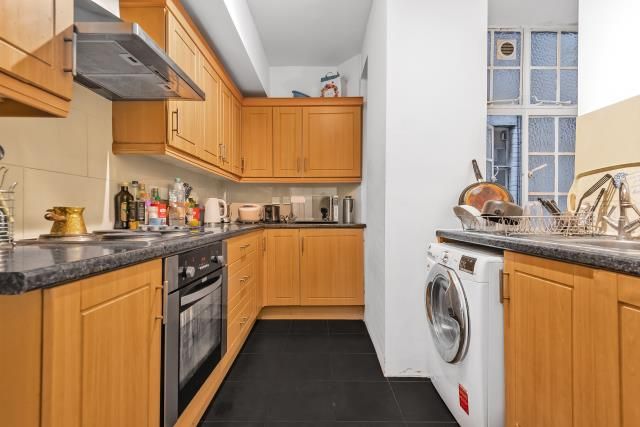 Property photo 3 of 12 Kitchen