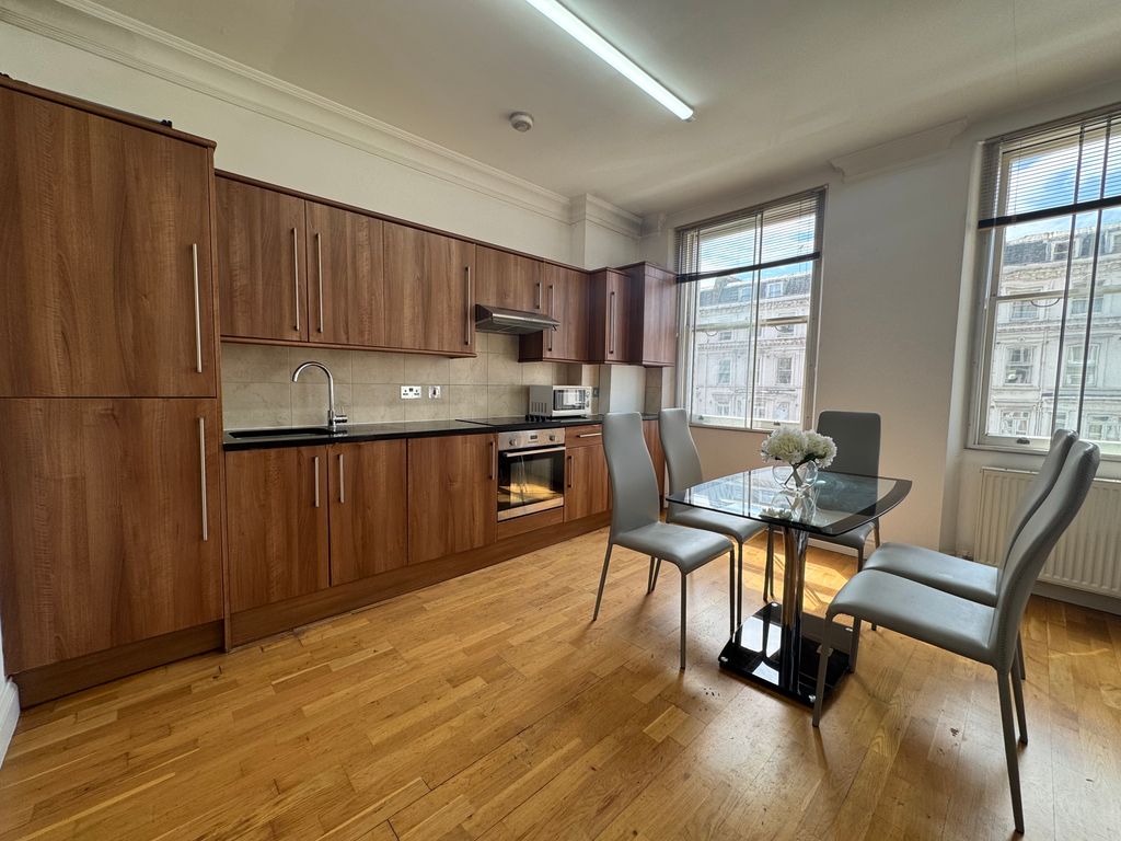 Property photo 3 of 11 Open Plan Kitchen
