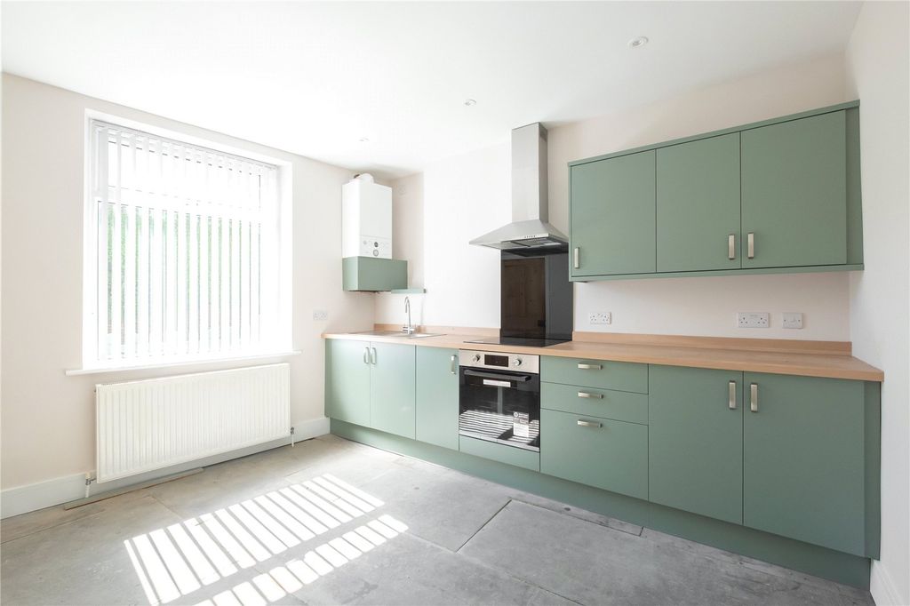 Property photo 2 of 13 Dining Kitchen
