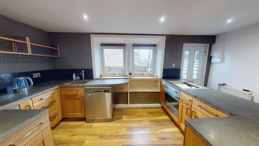 Property photo 3 of 12 Dining Kitchen