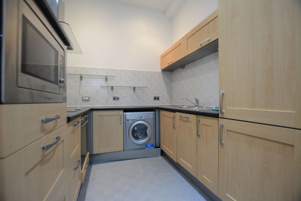 Property photo 3 of 7 Kitchen