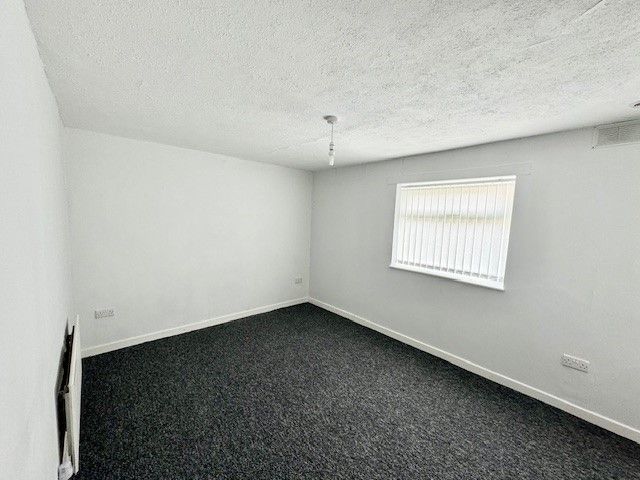 Property photo 3 of 8 Bedroom One