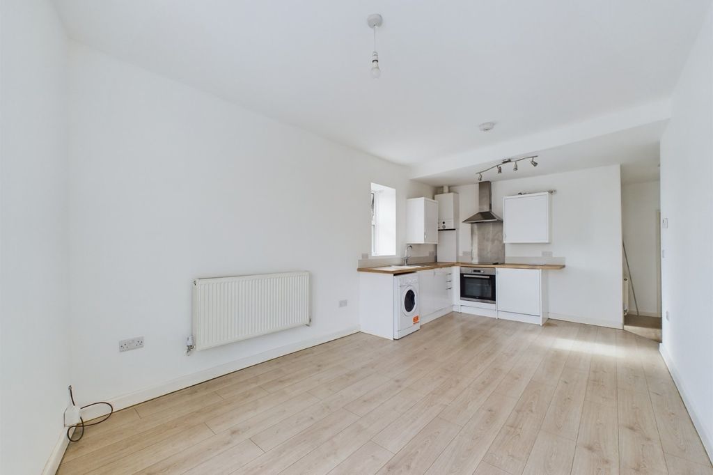 Property photo 3 of 8 Kitchen Area