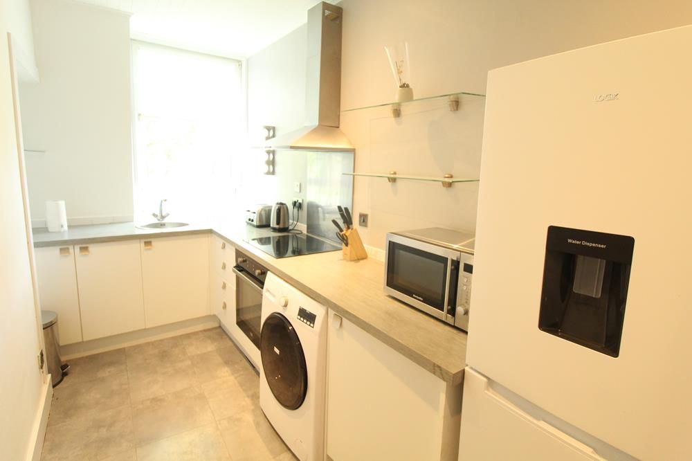 Property photo 2 of 6 Dining Kitchen