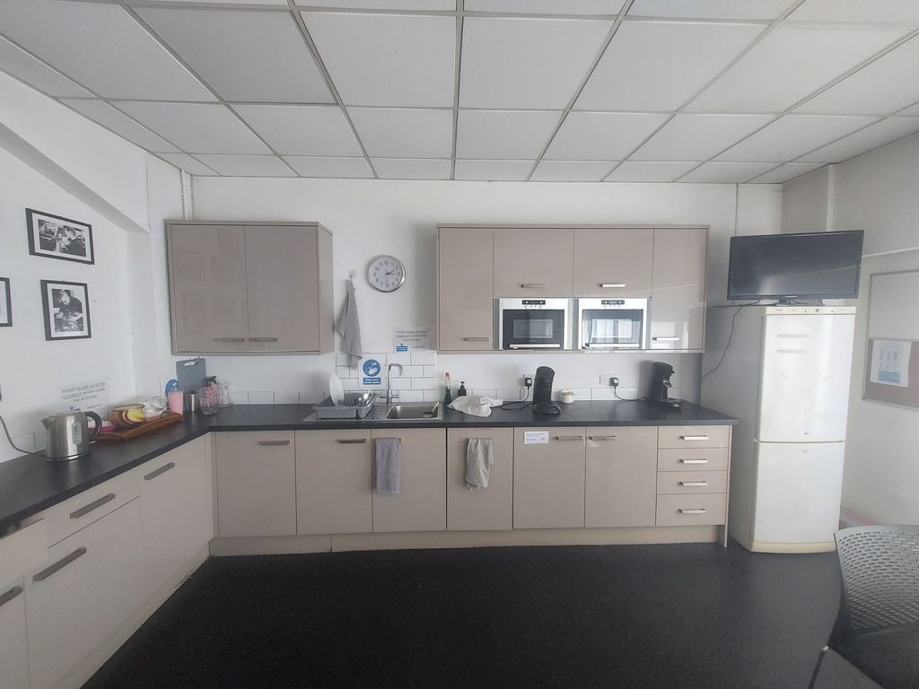 Property photo 3 of 6 Kitchen Area