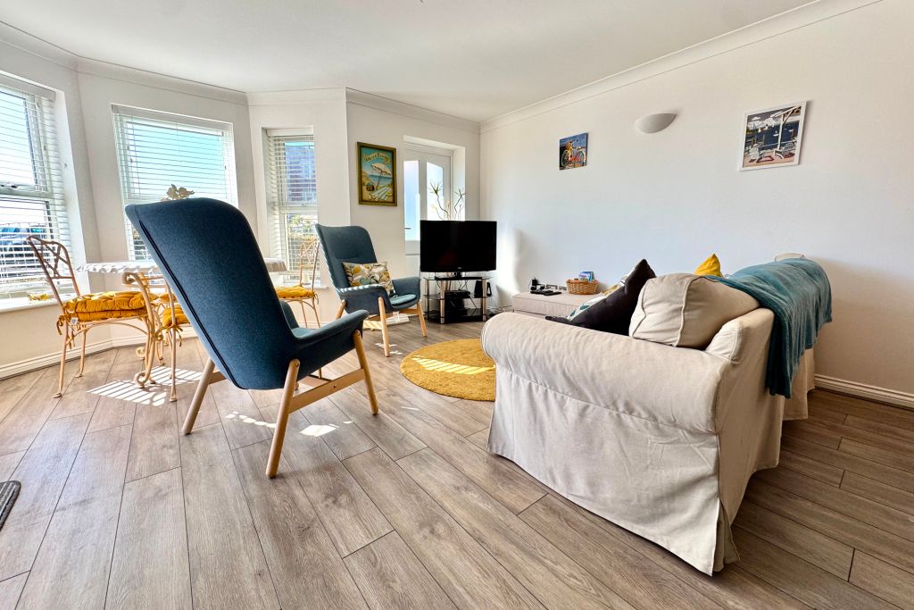 Property photo 3 of 12 Living Area