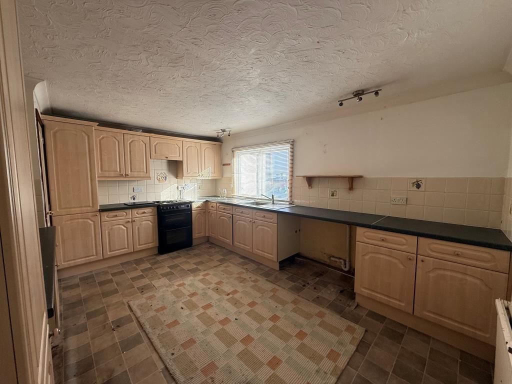 Property photo 3 of 10 Tiled Kitchen With Window And Space For Appliances