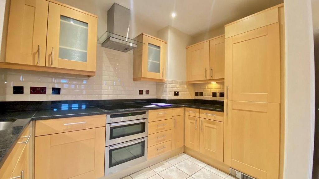 Property photo 1 of 12 Kitchen