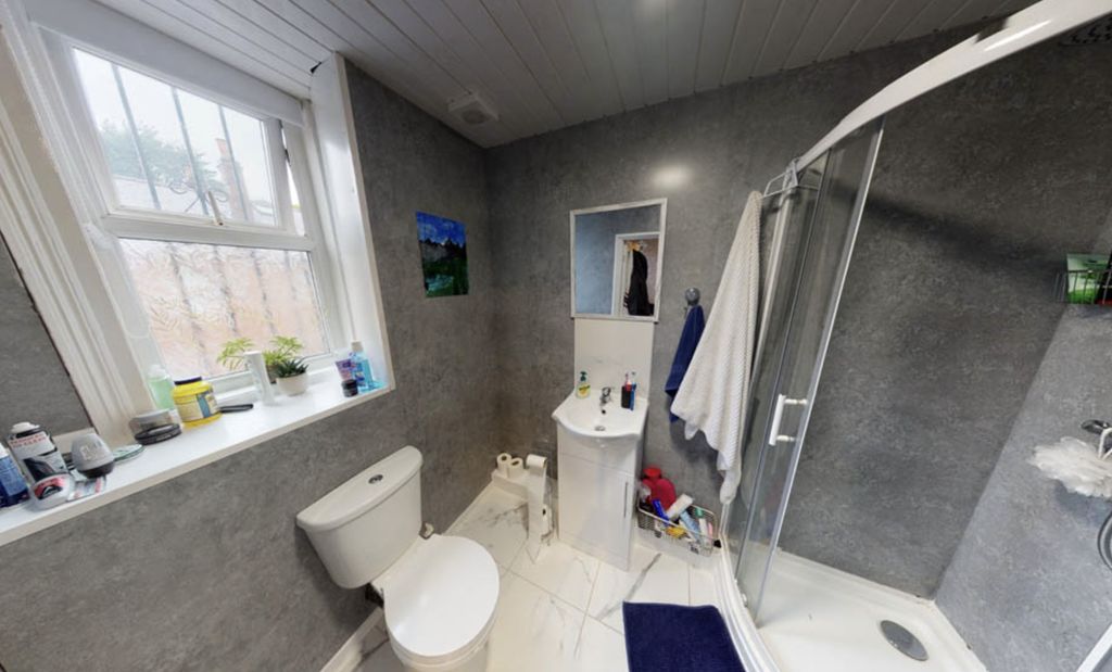 Property photo 2 of 8 A Clean, Bright Bathroom With A Large Bathtub And ...