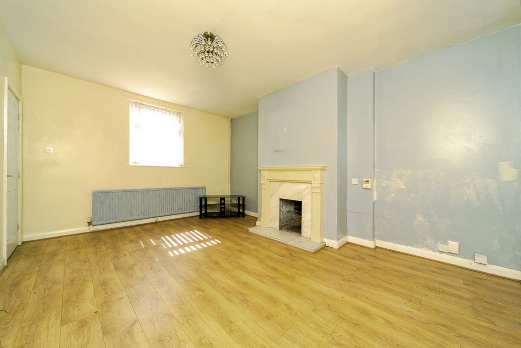 Property photo 2 of 17 Front Living Room