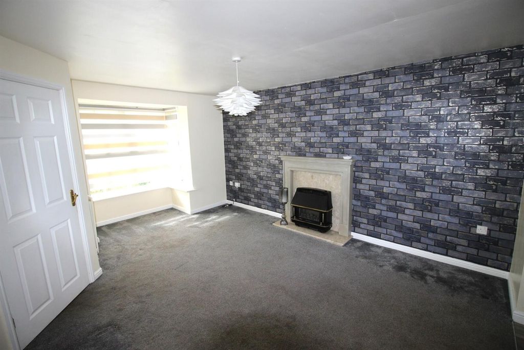 Property photo 3 of 13 Bright Lounge With Feature Wall And Bay Window...