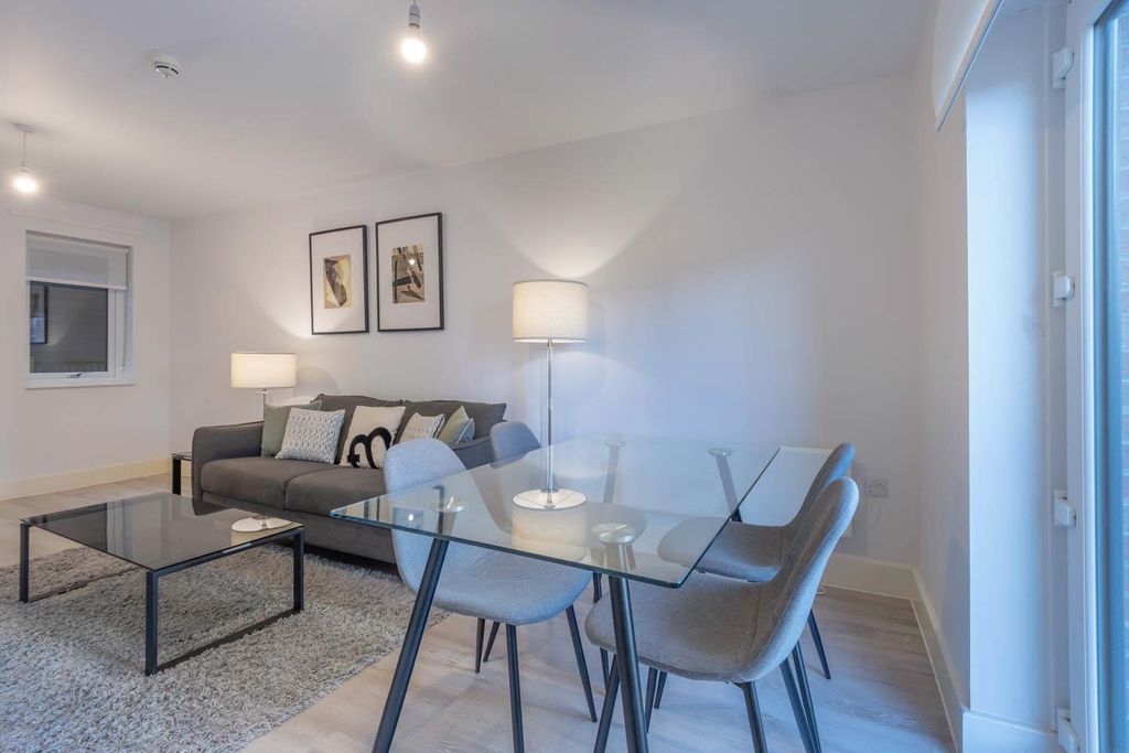 Property photo 3 of 13 Living Area