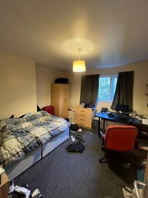 Property photo 2 of 6 A Modest Student Bedroom Featuring A Bed, Desk Wit...