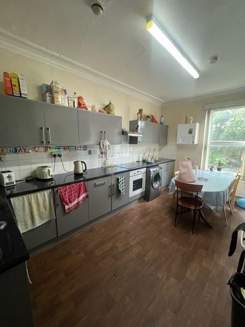 Property photo 2 of 11 Bright And Functional Kitchen With Ample Counter S...