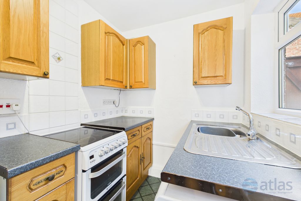 Property photo 2 of 12 Kitchen