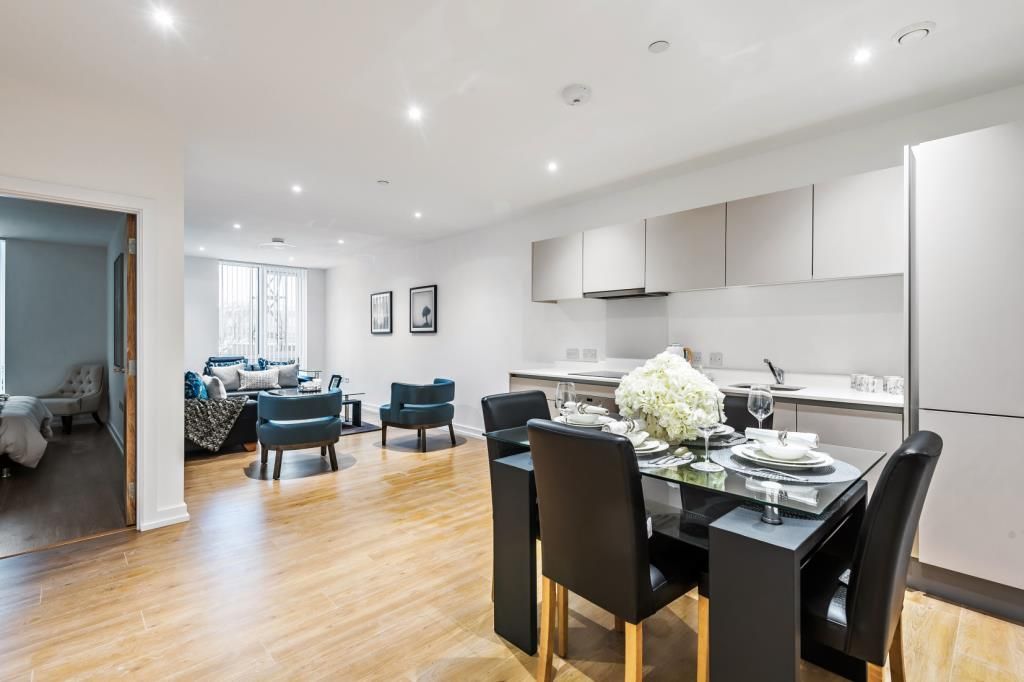 Property photo 3 of 11 Kitchen-Dining Area