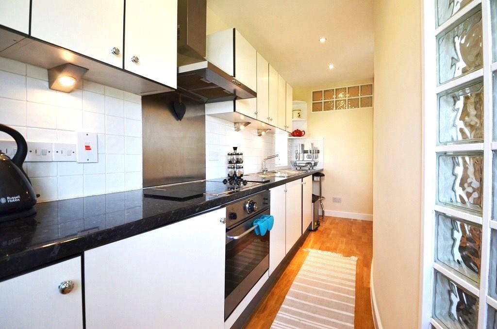 Property photo 3 of 8 Kitchen