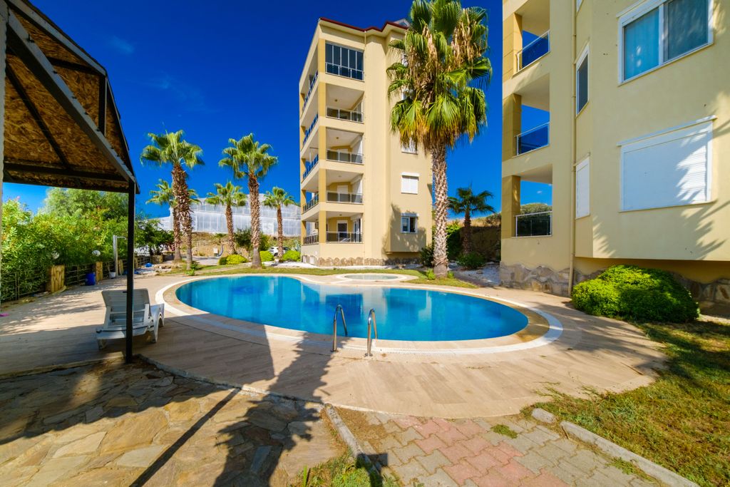 Property photo 3 of 21 Spacious 2-Bedroom Alanya Apartment For Sale - View Of Pool And Sun Terraces