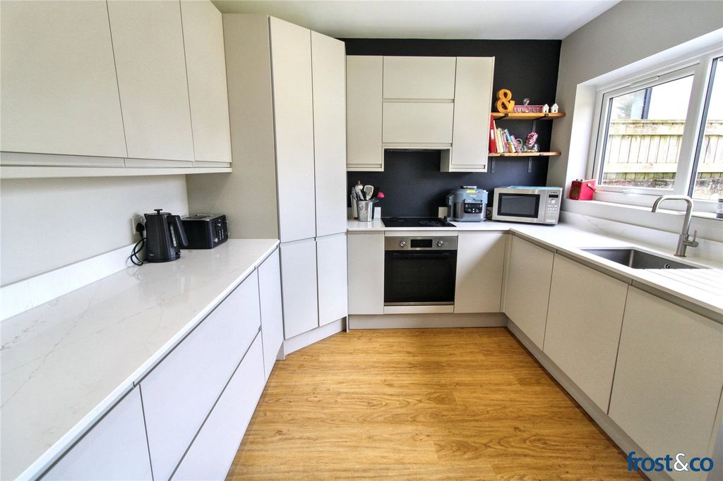 Property photo 3 of 12 Kitchen