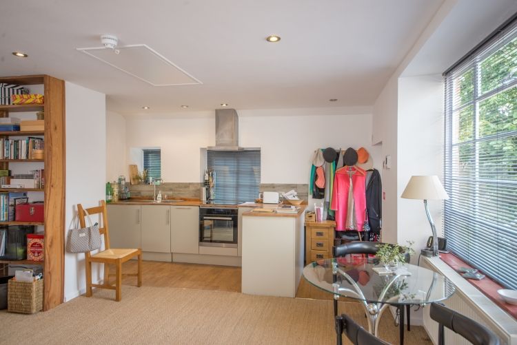 Property photo 3 of 7 Kitchen Area