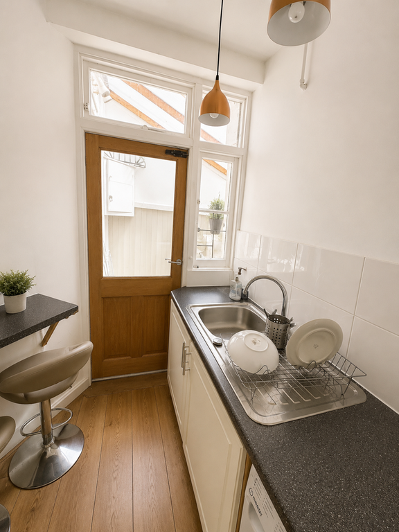 Property photo 3 of 7 Kitchen