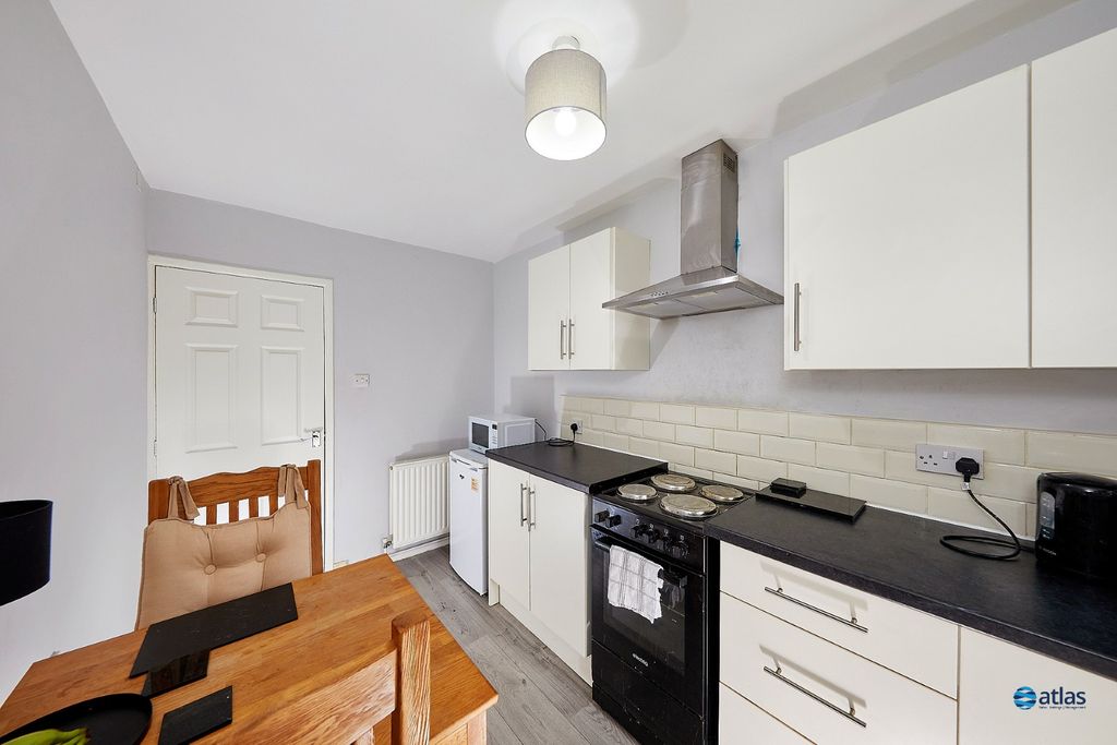 Property photo 3 of 12 Kitchen