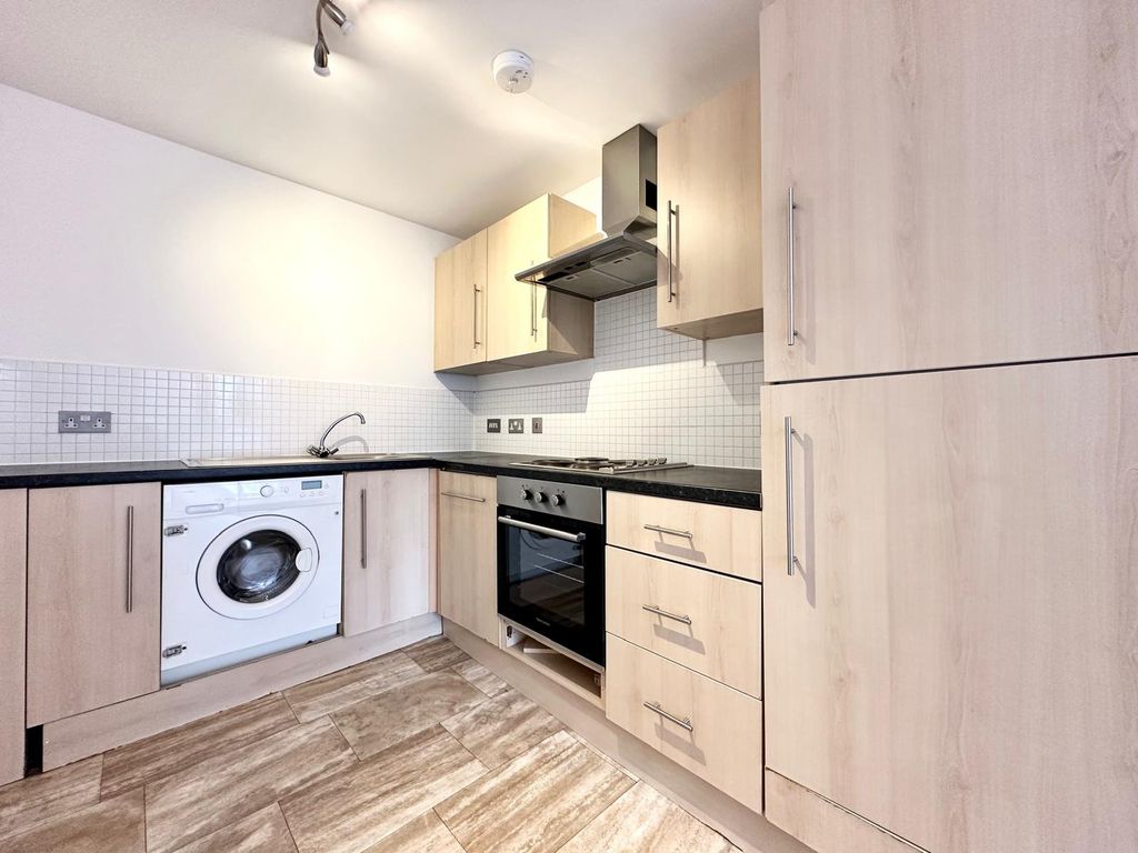Property photo 3 of 8 Kitchen