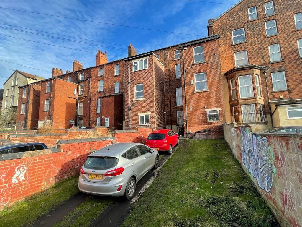 Property photo 3 of 9 Traditional Brick Terrace Under A Bright Blue Sky...