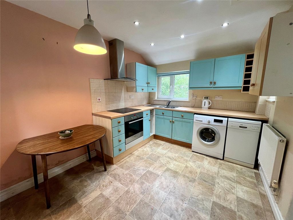 Property photo 2 of 14 Dining Kitchen