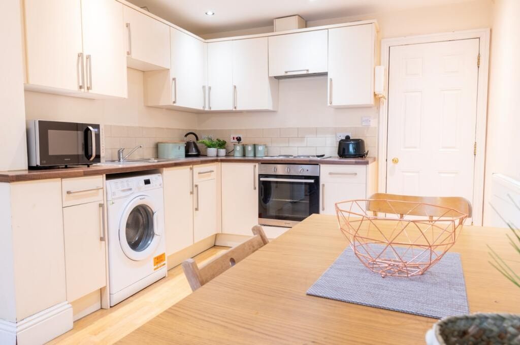Property photo 3 of 7 This Beautifully Designed Kitchen Features Modern ...