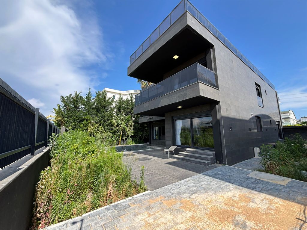 Property photo 1 of 21 Opulent Antalya Property For Sale - Main View Of The Two-Storey Villa