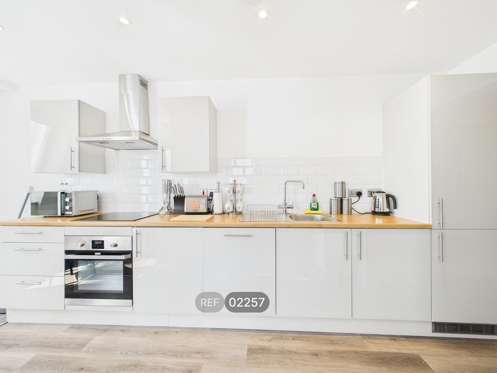 Property photo 1 of 16 Kitchen &amp; Living Area