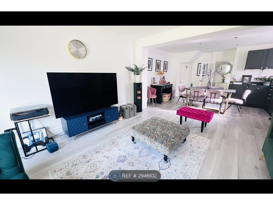 Property photo 2 of 11 Living Room & Kitchenette