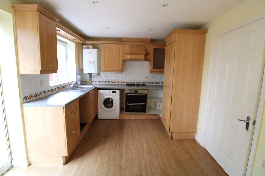 Property photo 2 of 16 Kitchen Area