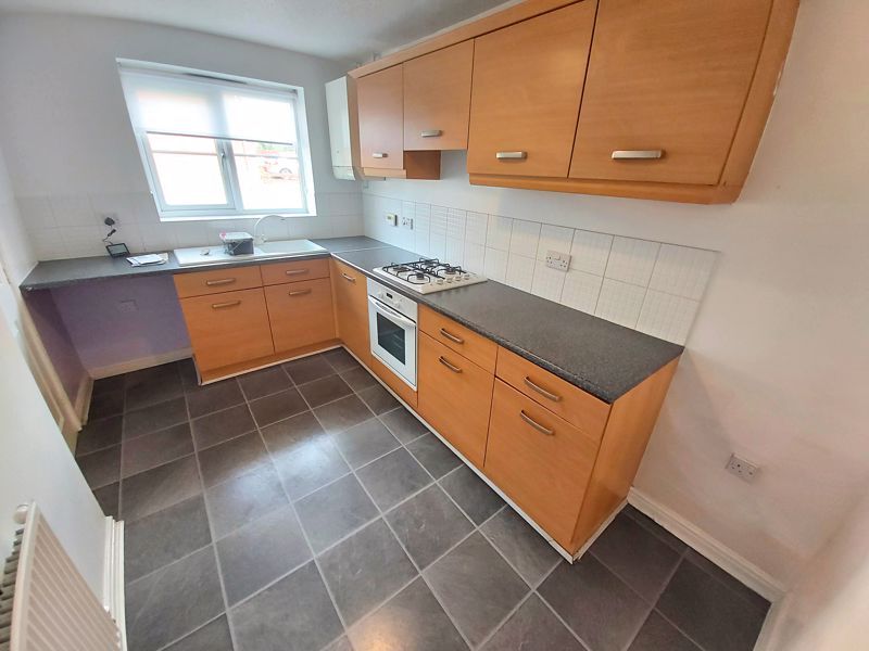 Property photo 3 of 12 Kitchen