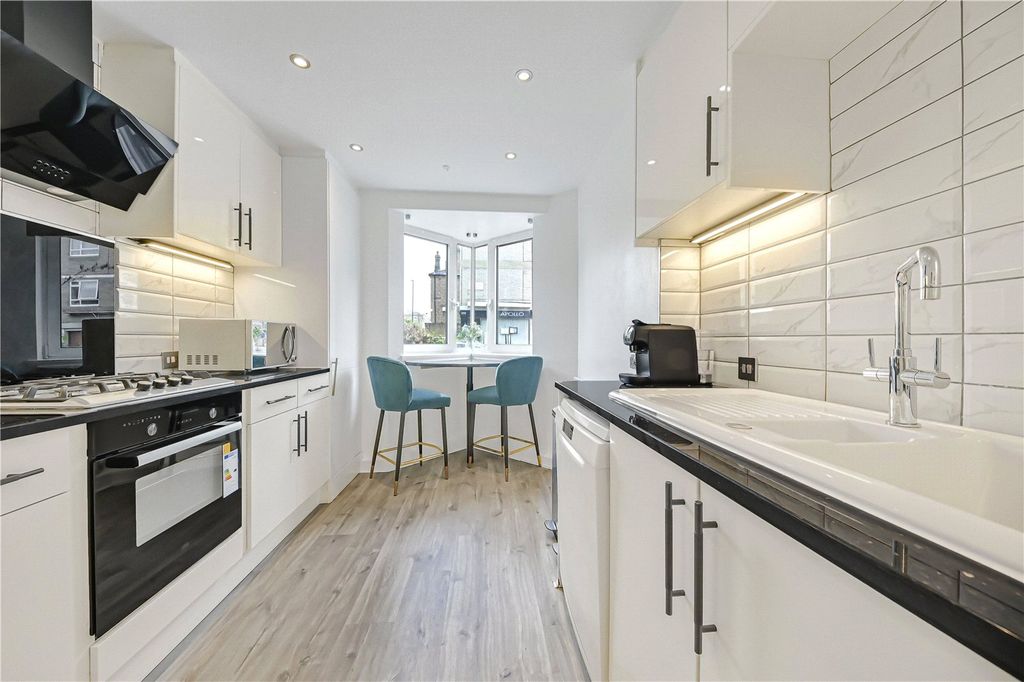 Property photo 3 of 12 Kitchen