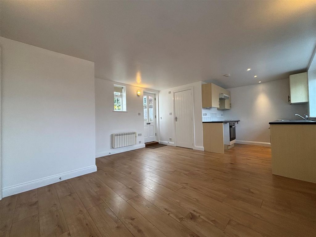 Property photo 3 of 12 Living/Dining Area