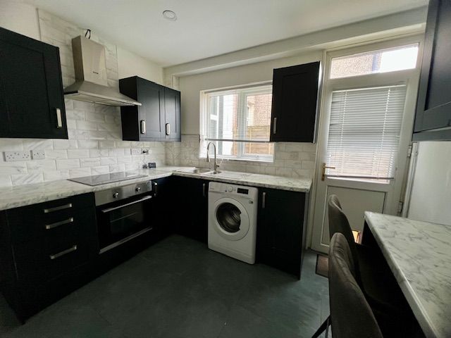 Property photo 3 of 13 Kitchen