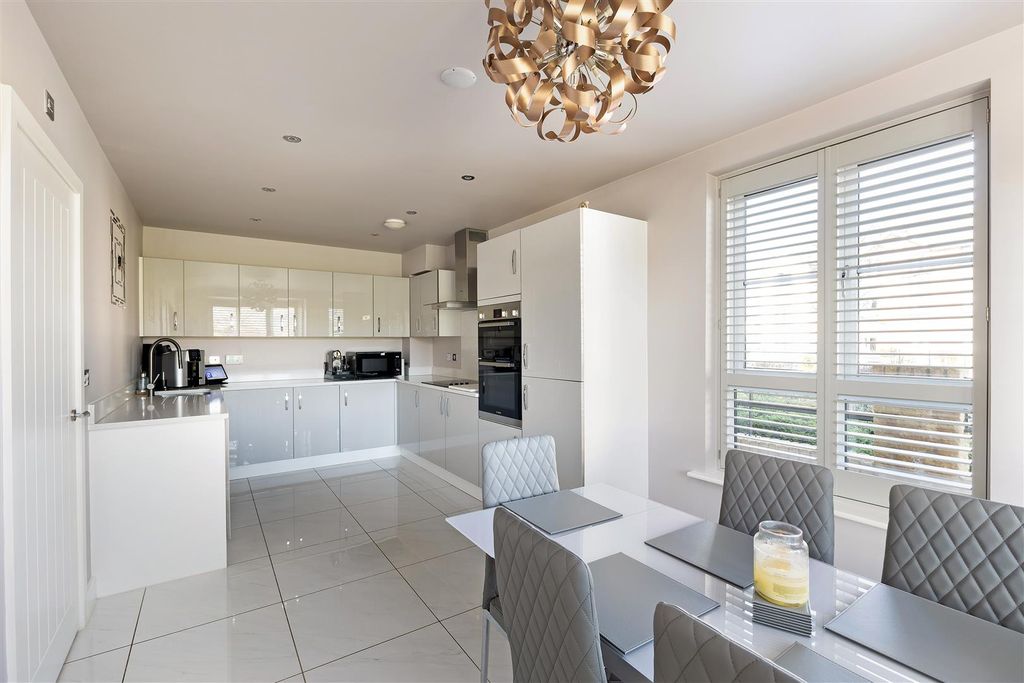 Property photo 3 of 13 Kitchen &amp; Dining Area