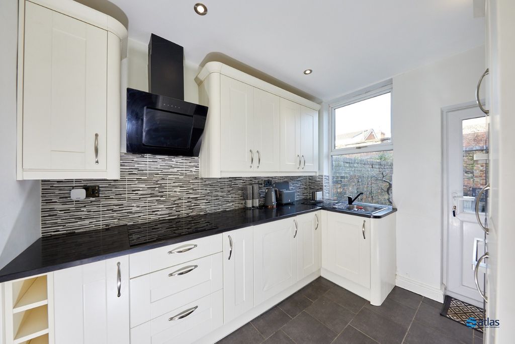 Property photo 2 of 12 Kitchen