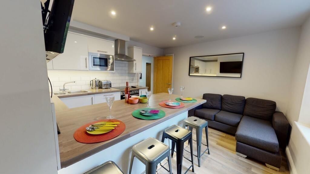 Property photo 2 of 8 A Modern Open-Plan Living Room And Kitchen Area Fe...